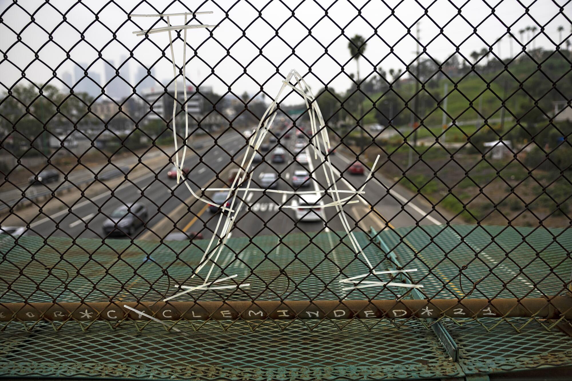 Pedestrian bridge over the 110 freeway connecting Chinatown to the area where the Dodger Stadium is located.