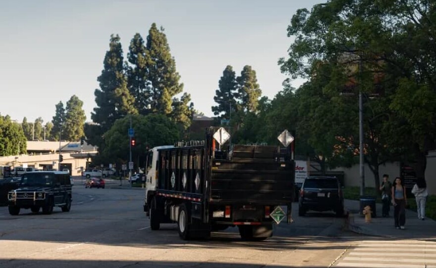 Pedestrians and vehicles pass through Gayley Avenue, a public road where UCLA trucks carry hazardous waste between different parts of campus,  on March 17, 2026. 