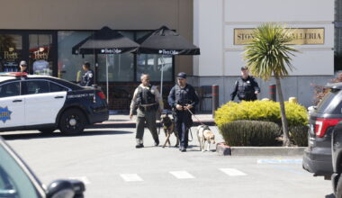 San Francisco Police Department members and San Francisco Sheriffs department members work outside Stonestown Galleria during an evacuation on Wednesday, March 25, 2026 in San Francisco.