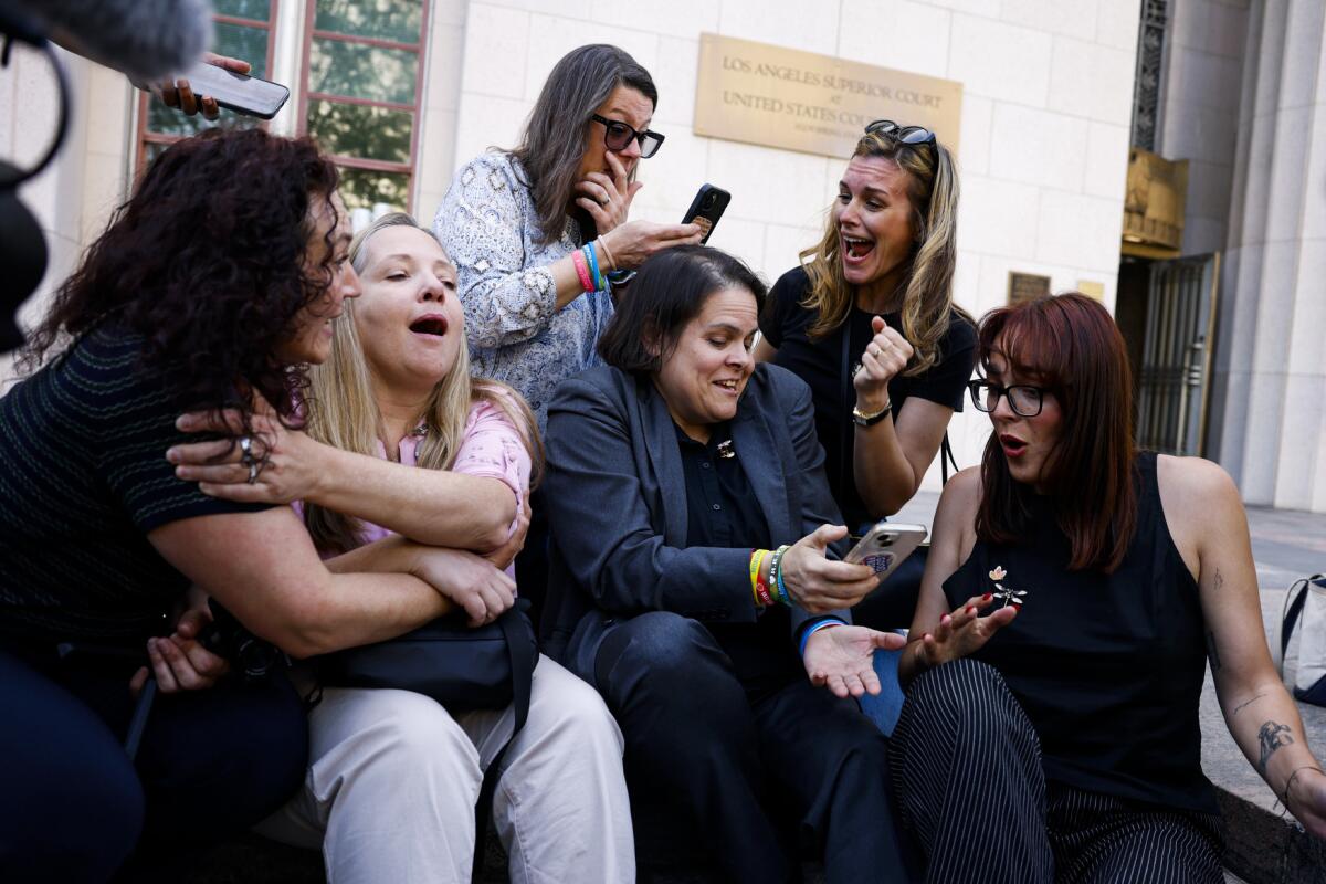 victims families and supporters react to the verdict outside the Los Angeles Superior Court