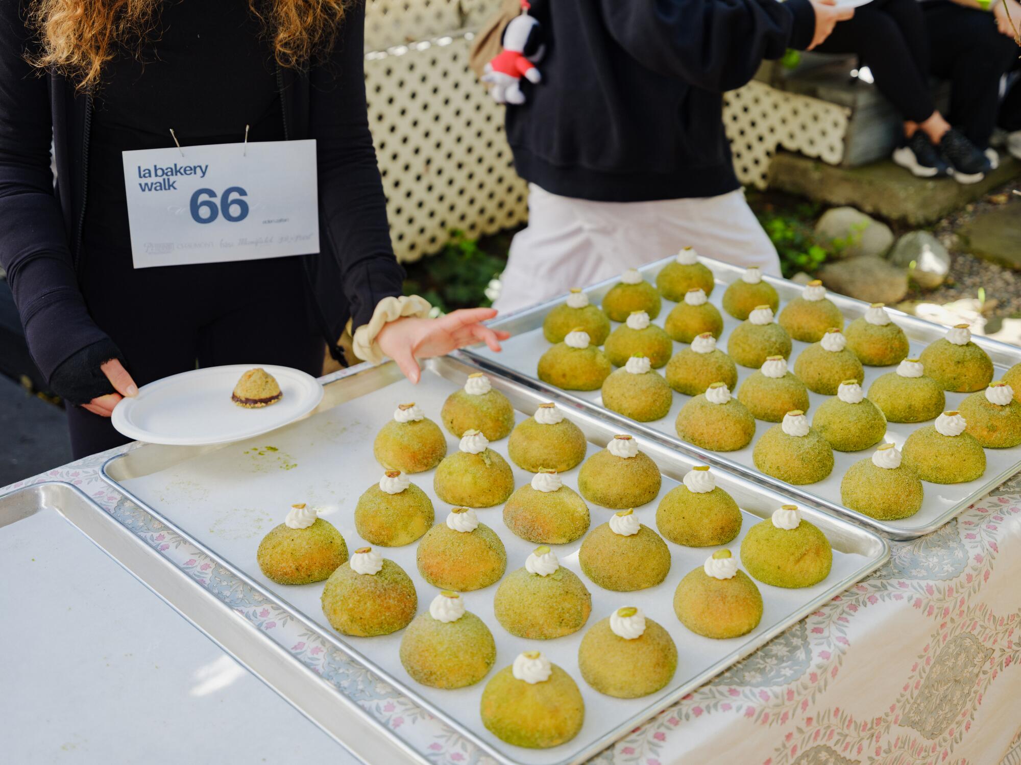 Matcha pistachio buns on a tray.