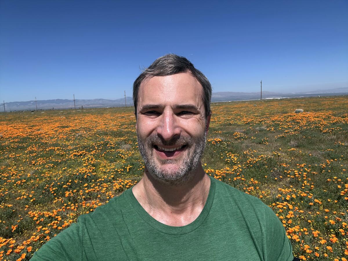 Steve Klosterman in a field of California poppies.
