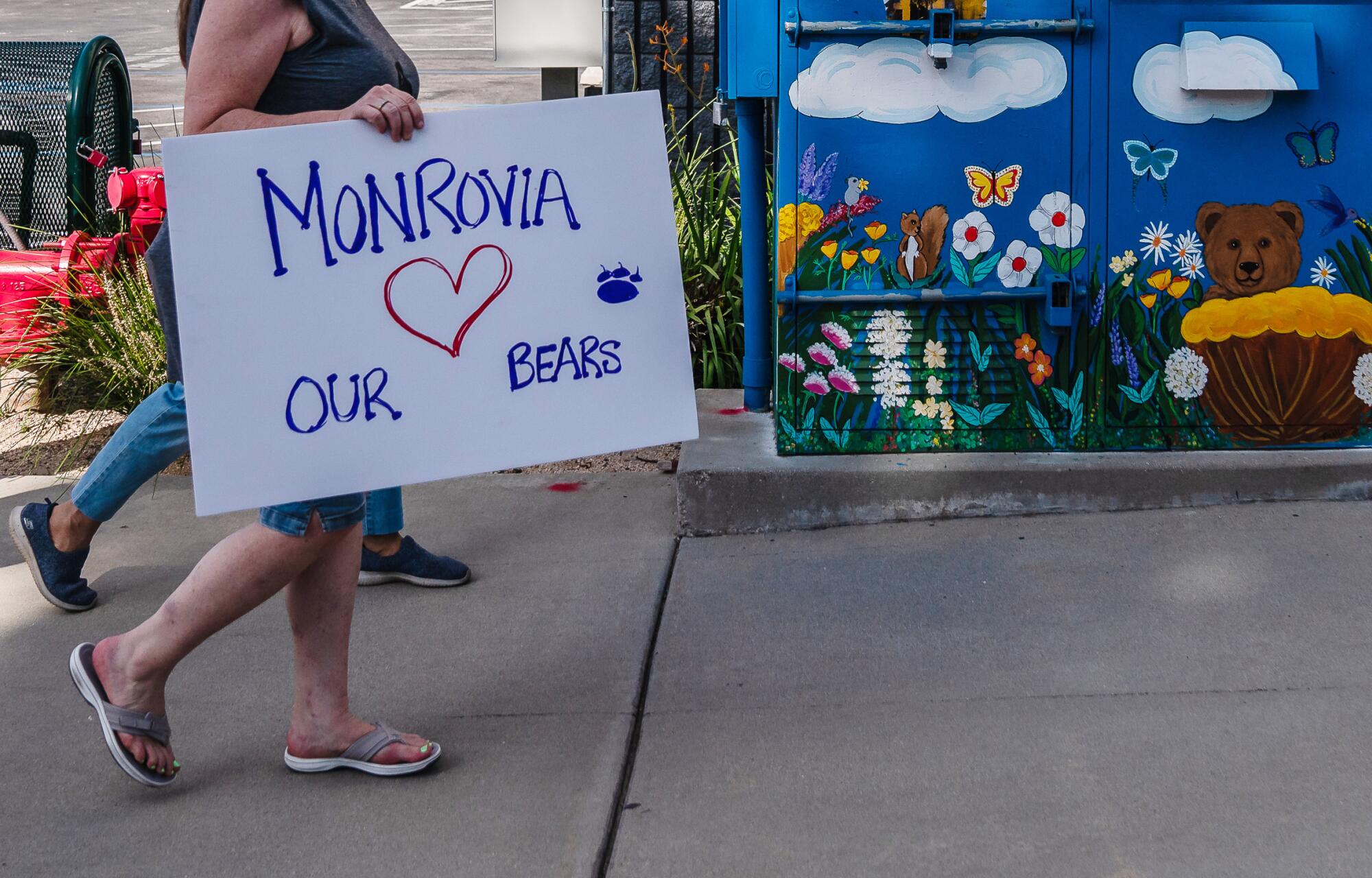 Community members walk for Blondie the bear.