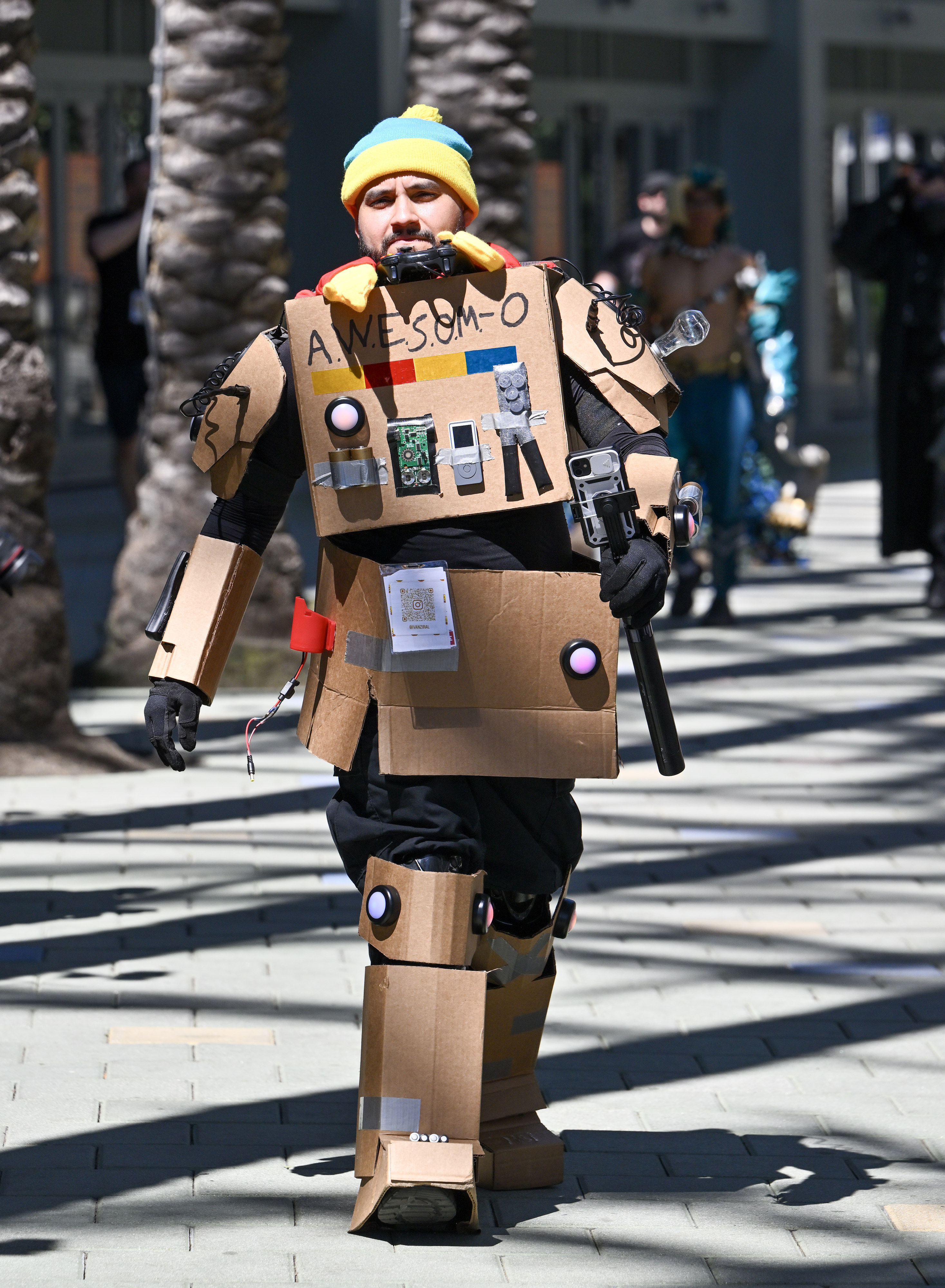 Ivan Ziral, dressed as A.W.E.S.O.M.E-O from Fortnite, during WonderCon at...