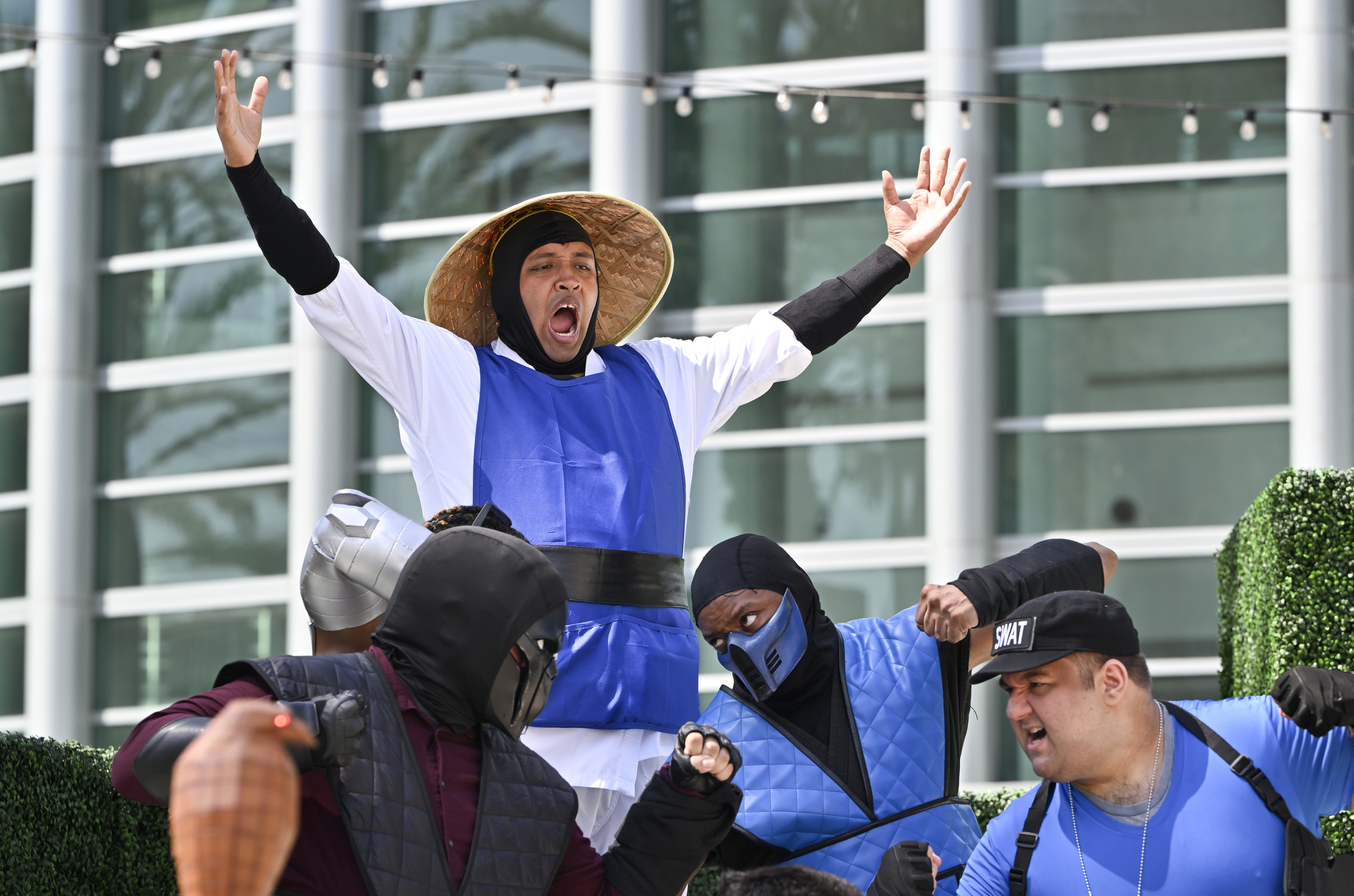 Joseph Vallejo, dresses as Raiden from Mortal Combat 2, atop...