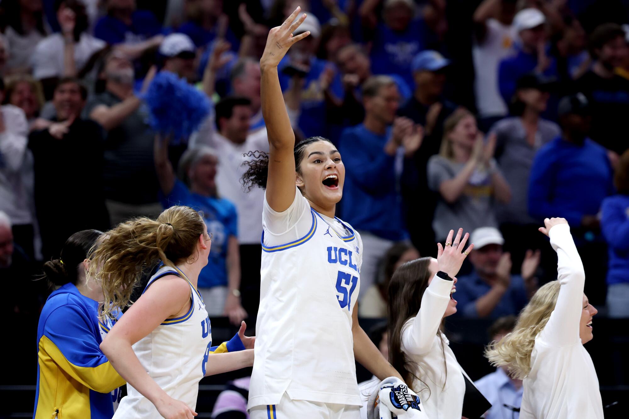 UCLA center Lauren Betts celebrates against Minnesota in the first half Friday.