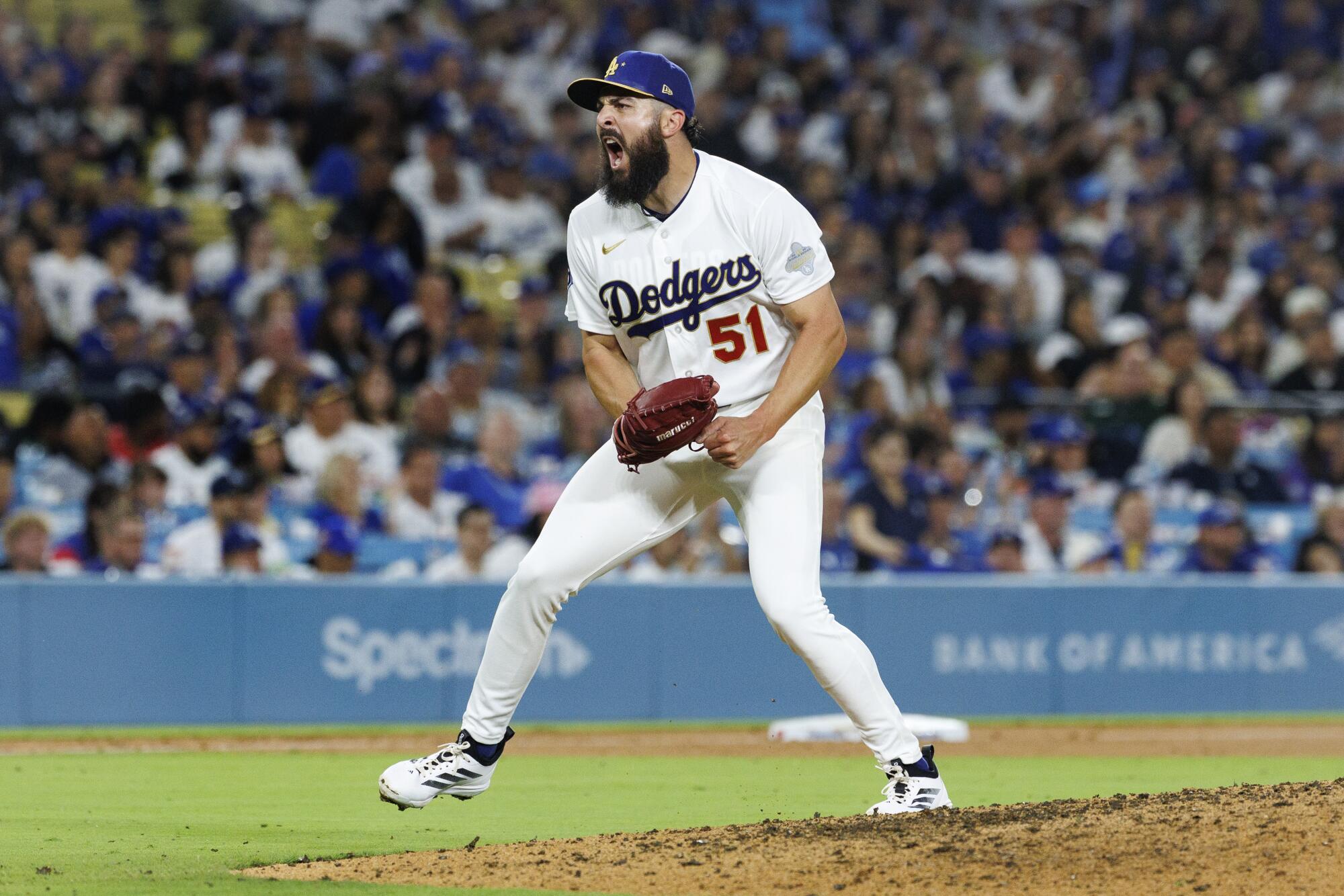 Dodgers relief pitcher Alex Vesia reacts after striking out Arizona's Geraldo Perdomo to retire the side.