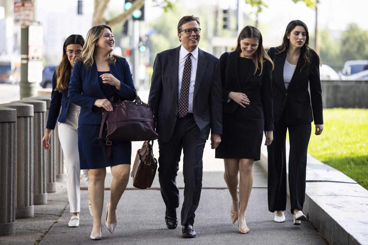 plaintiffs, attorneys, and staff arrive in the morning to the Los Angeles County Superior Court