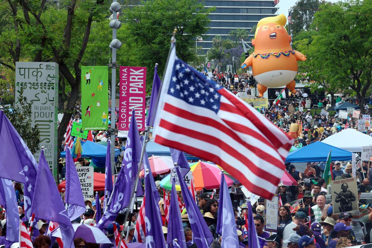 Hundreds gather at the "No Kings" national day of protest at Gloria Molina Grand Park.
