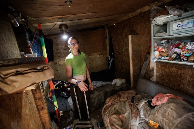 Jasmin B., a resident of "The Jungle," inside the makeshift structure where she lives at the homeless encampment March 18, 2026, in San Jose, Calif. (Dai Sugano/Bay Area News Group)