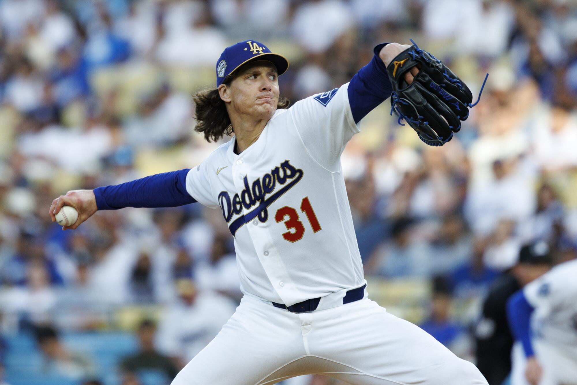 Dodgers pitcher Tyler Glasnow delivers during the first inning against the Diamondbacks on Saturday.