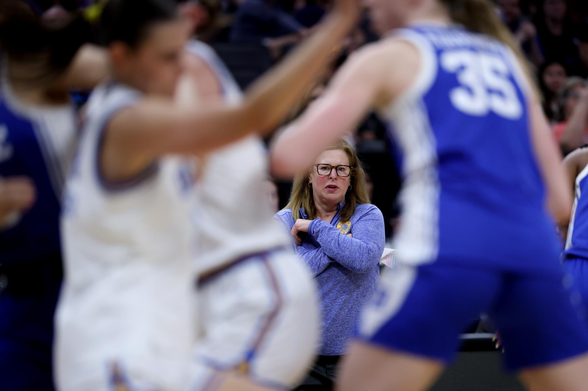 UCLA coach Cori Close watches play during the Bruins' win over Duke on Sunday.