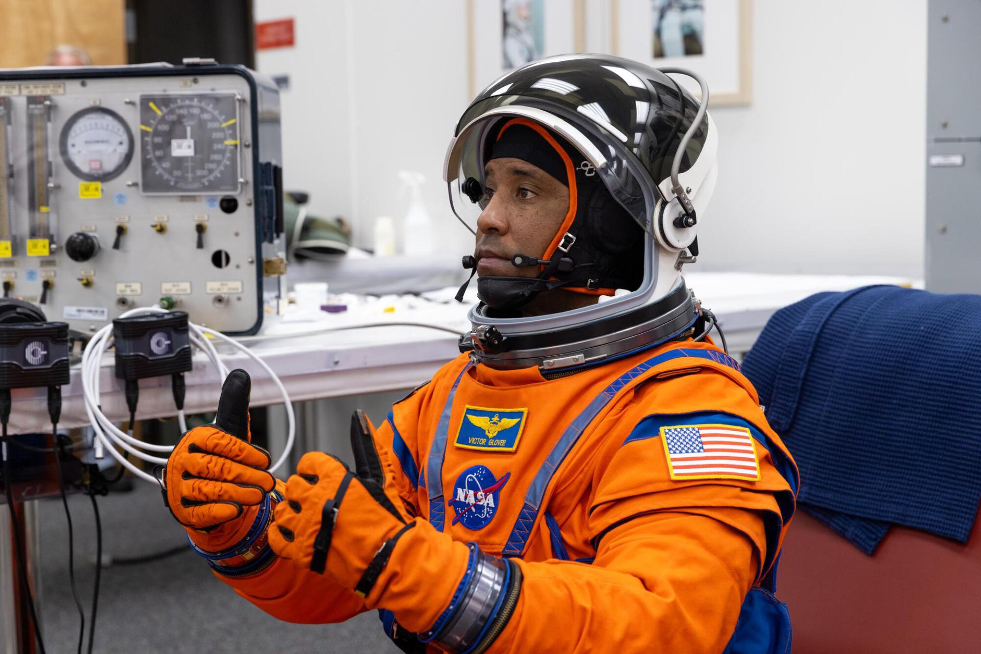 NASA astronaut Victor Glover, Artemis II pilot, undergoes spacesuit checks.