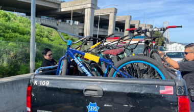 Footage shows nearly 100 cyclists biking against traffic toward I-80
