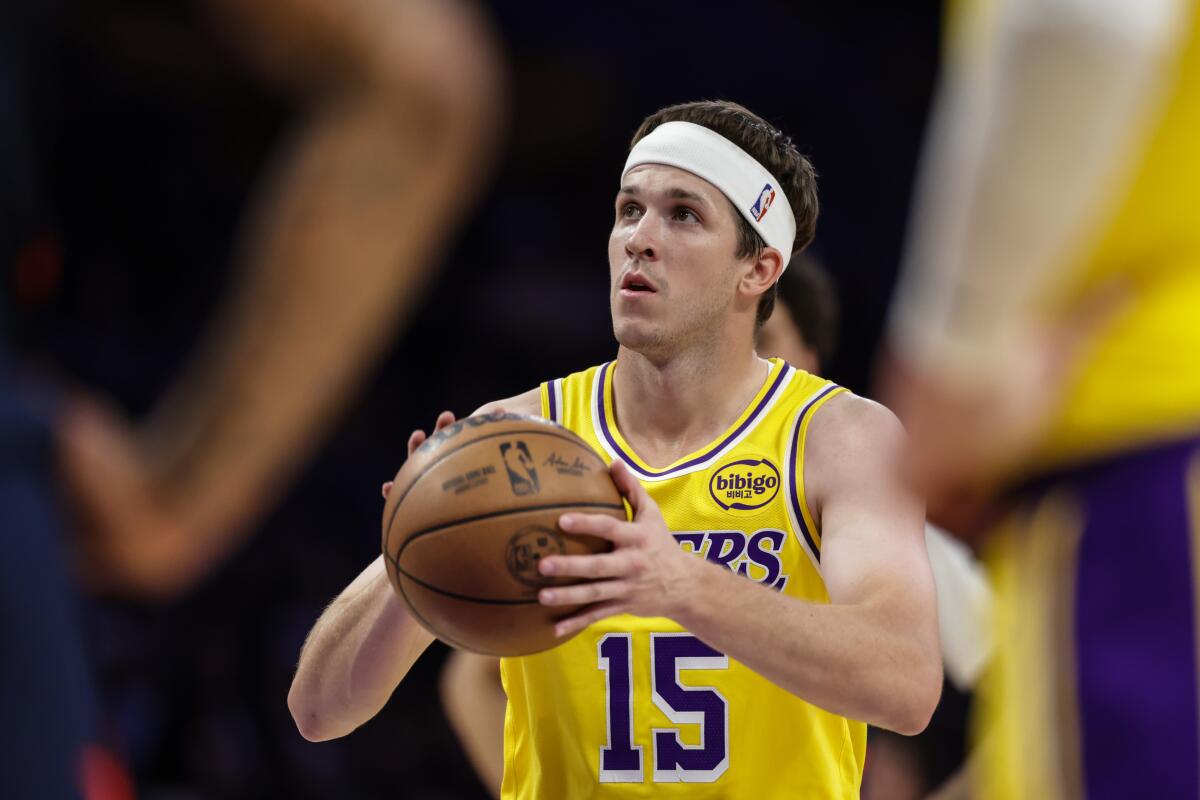 Lakers guard Austin Reaves shoots a free throw during a win over the Washington Wizards on Monday at Crypto.com Arena.