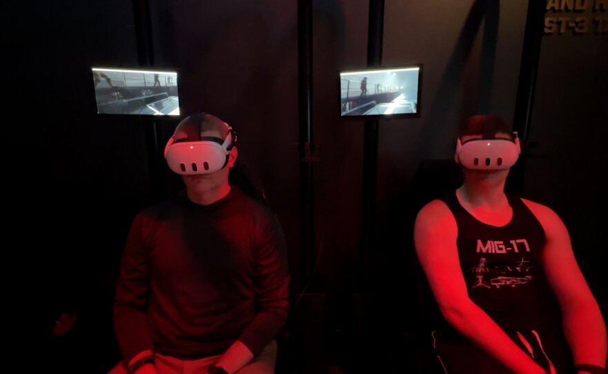 Visitors to the Navy SEAL Museum San Diego are shown wearing virtual reality goggles at the museum's VR experience on March 23, 2026.