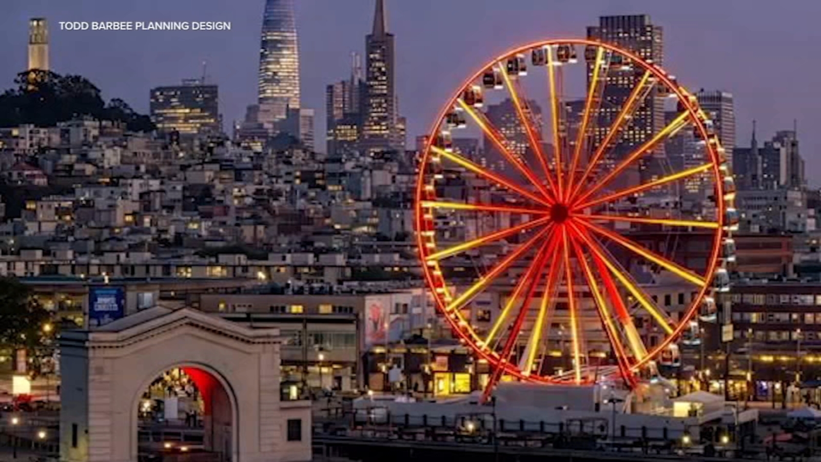 SkyStar Wheel glows red and gold over at San Francisco's Fisherman's Wharf in honor of Chinese New Year Parade