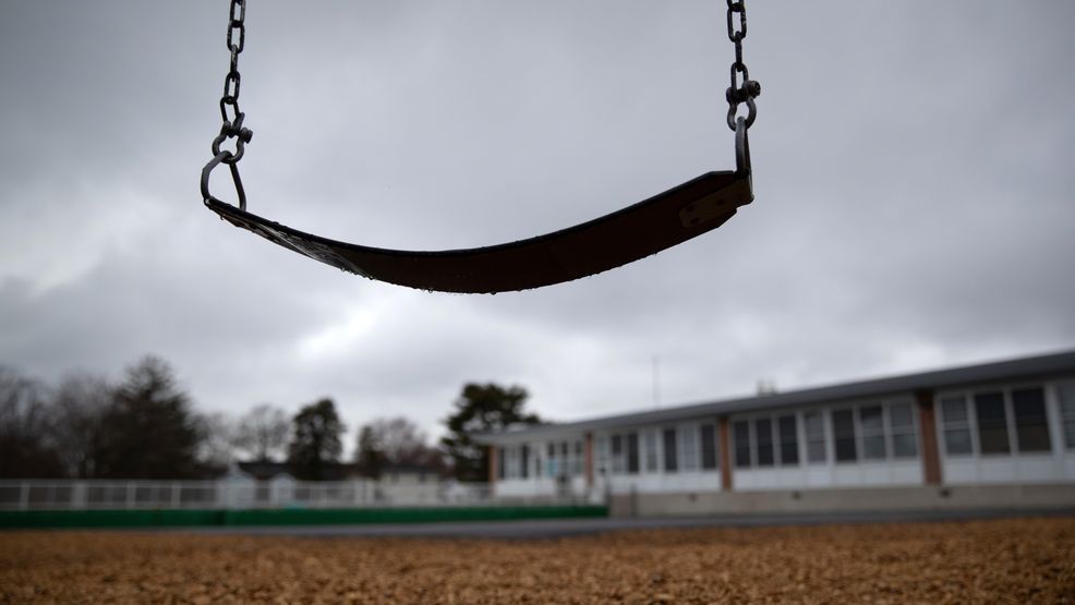 FILE - Playground swings.   (Photo by John Moore/Getty Images)