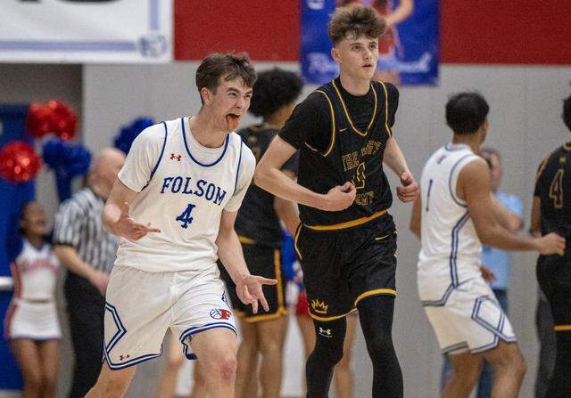 The Folsom Bulldogs' Jack Shull reacts after making a 3-pointer in the second half of the CIF Northern California Regional Division I boys basketball championship against the Kings Academy Knights on Tuesday in Folsom.