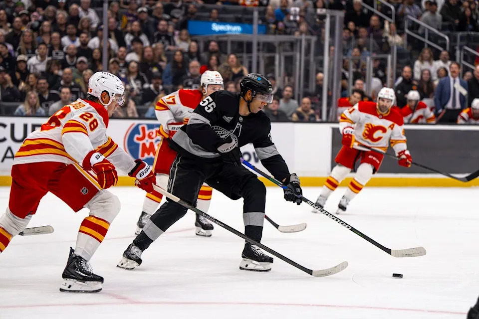 Los Angeles Kings right wing Quinton Byfield (55) moving the puck onto enemy ice during an NHL hockey game against the Calgary Flames on February 26th, 2026 in Los Angeles, CA.