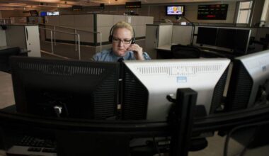 Sacramento Police Dispatcher II Sarah Kern receives emergency calls at Sacramento Police Communication Center in 2013.