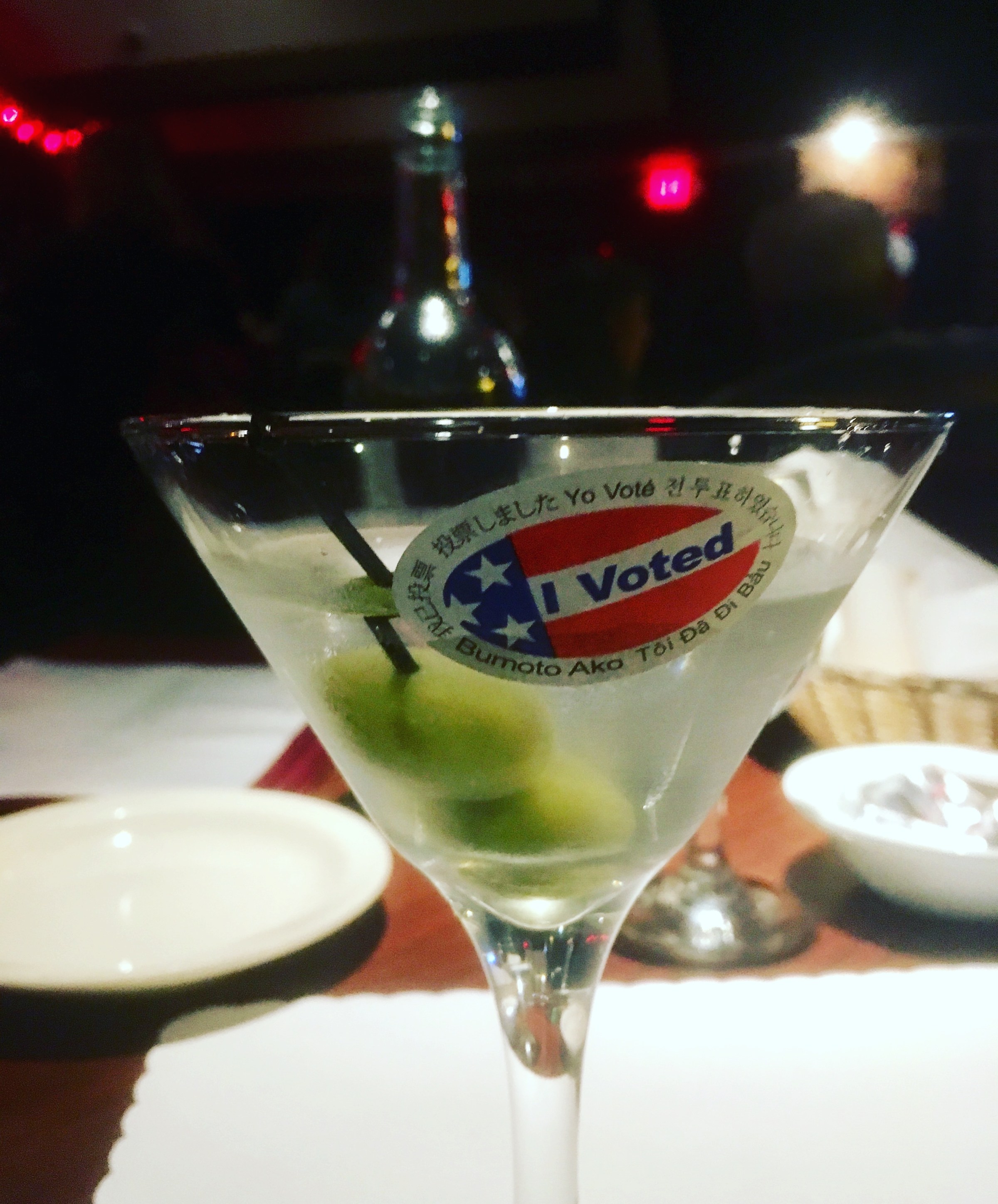 “I Voted” sticker on a martini glass at Taix.