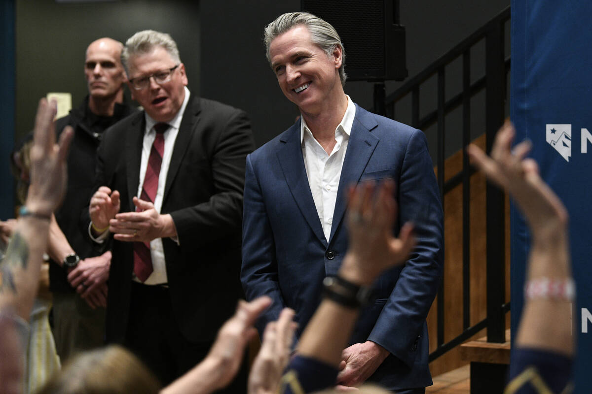 California Governor Gavin Newsom arrives for a book tour stop Wednesday, March 4, 2026, in Las ...
