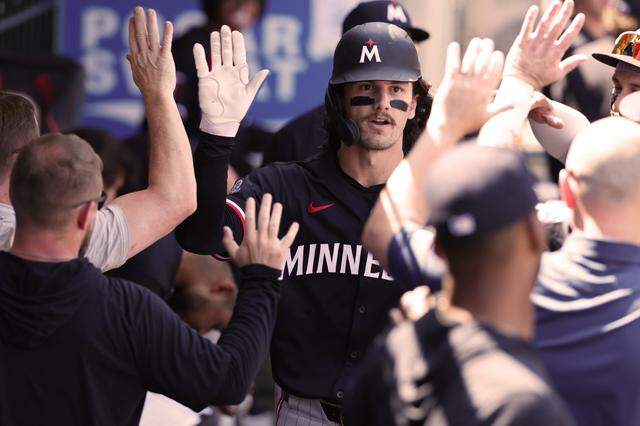 James Outman of the Minnesota Twins celebrates in his dugout after a home run hit in the third inning against the Los Angeles Angels at Angel Stadium of Anaheim on Sept. 10, 2025 in Anaheim.