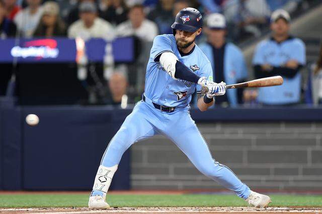 Nathan Lukes of the Toronto Blue Jays hits a single in the first inning against the Los Angeles Dodgers in Game 6 of the 2025 World Series at Rogers Centre on Oct. 31, 2025 in Toronto, Ontario.