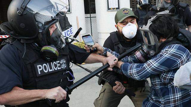 Protesters clash with police during a “national strike” protest against U.S. Immigration and Customs Enforcement in Los Angeles on January 30, 2026. A Fresno politician recounts being deported during Operation Wetback and warns how ICE policies continue to harm families, urging humane immigration reform.