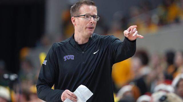 Coach Mark Campbell of the TCU Horned Frogs points to the bench against the Baylor Bears on Feb. 12, 2026, in Waco, Texas.