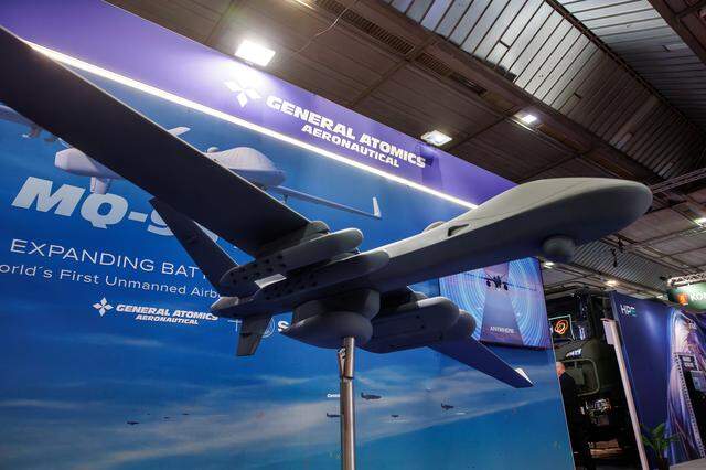 BRUSSELS, BELGIUM - MARCH 12: A scale model of a General Atomics MQ-9B drone is displayed at the company's stand during the inaugural edition of the Brussels European Defence Exhibition & Conference (BEDEX) on March 12, 2026 in Brussels, Belgium. The new BEDEX event has been created in partnership with the Belgian Ministry of Defence and Armed Forces to showcase the European and NATO defence industries, as Belgium and other European countries increase defence spending in response to the current geopolitical climate. (Photo by Omar Havana/Getty Images)