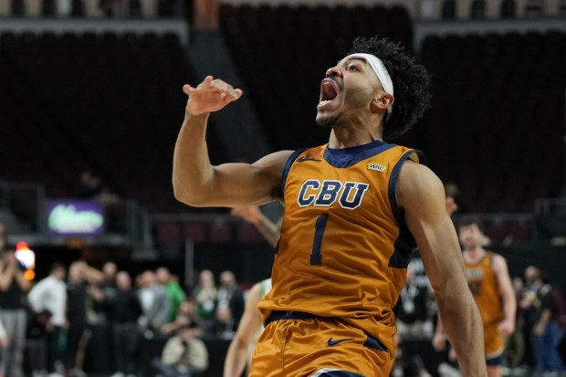 LAS VEGAS, NEVADA - MARCH 14: Dominique Daniels Jr. #1 of the California Baptist Lancers celebrates defeating the Utah Valley Wolverines 63-61 in the championship game of the Western Athletic Conference men's basketball tournament at the Orleans Arena on March 14, 2026 in Las Vegas, Nevada. (Photo by Candice Ward/Getty Images)