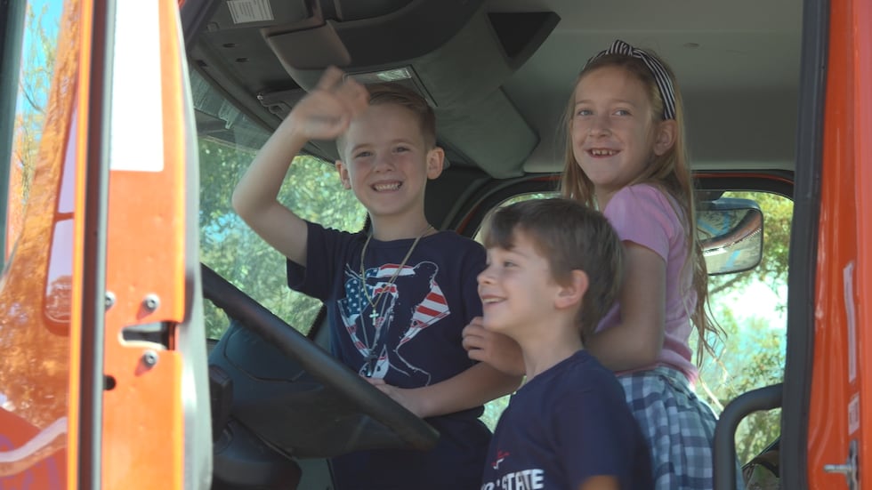 Families get hands-on look at vehicles from local businesses, emergency services