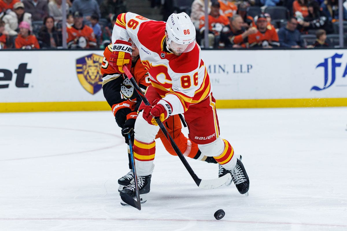 Calgary Flames left wing Joel Farabee (86) defends the puck during an NHL match against the Anaheim Ducks on March 1, 2026 in Anaheim, California. Calgary Flames left wing Joel Farabee (86) defends the puck during an NHL match against the Anaheim Ducks on March 1, 2026 in Anaheim, California.