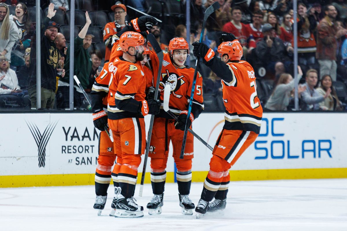 Anaheim Ducks defenseman Radko Gudas (7) celebrates with teammates after scoring a goal during an NHL match against the Montreal Canadiens on March 6, 2026 in Anaheim, California.