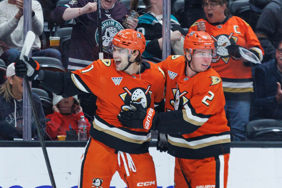 Anaheim Ducks left wing Cutter Gauthier (61) celebrates with defenseman Jackson LaCombe (2) after scoring a goal during an NHL match against the Montreal Canadiens on March 6, 2026 in Anaheim, California.