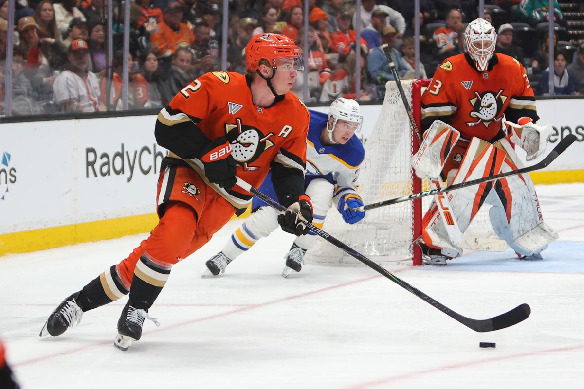 Anaheim Ducks defenseman Jackson LaCombe (2) skates with the puck during an NHL game against the Buffalo Sabres on March 22, 2026 in Anaheim, CA.