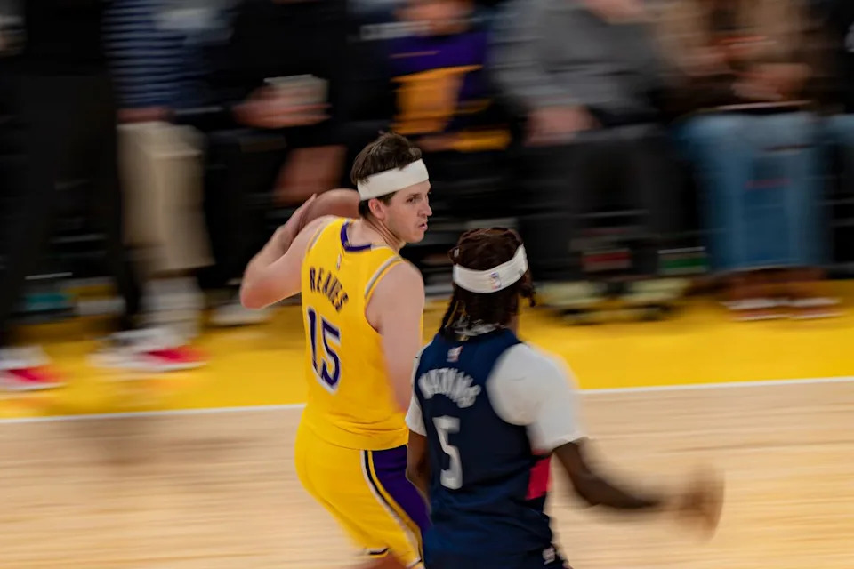 Los Angeles Lakers guard Austin Reaves (15) staring down his opponent while dribbling during an NBA basketball game against the Washington Wizards on March 30th, 2026 in Los Angeles, CA.