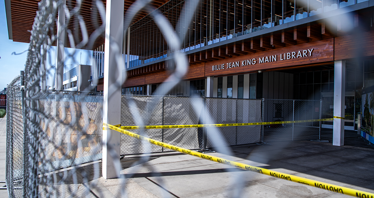 Long Beach begins building fence around Billie Jean King Library in downtown • Long Beach Post News