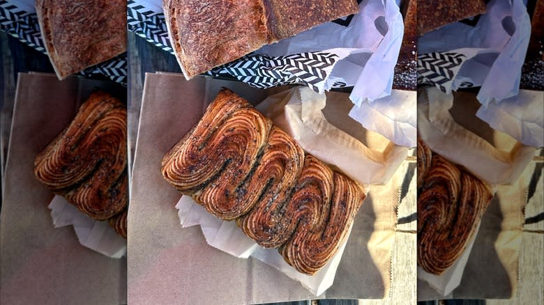 Overhead view of a black sesame croissant loaf