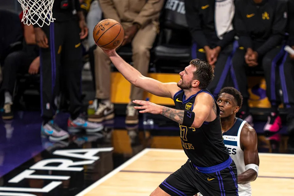 Los Angeles Lakers guard Luka Doncic (77) shooting a layup during an NBA basketball game against the Minnesota Timberwolves on March 10th, 2026 in Los Angeles, CA.