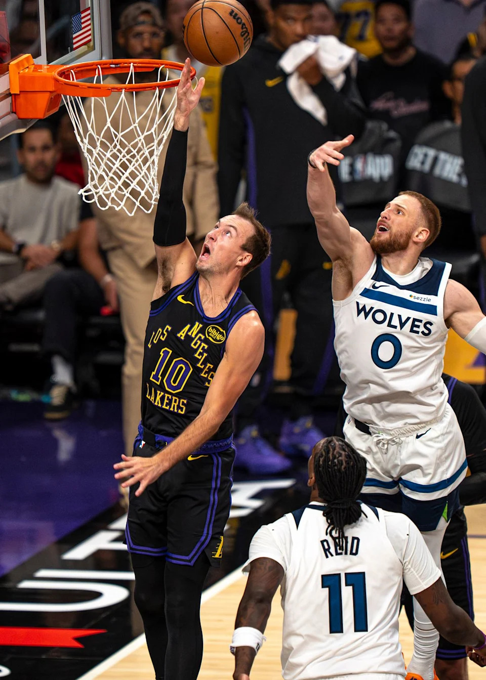 Los Angeles Lakers guard Luke Kennard (10) successfully shooting a layup during an NBA basketball game against the Minnesota Timberwolves on March 10th, 2026 in Los Angeles, CA.