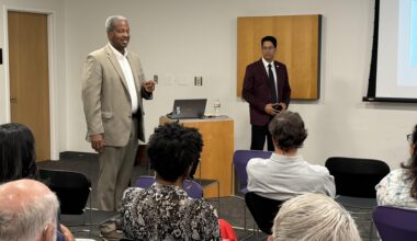 Fort Bend County Precinct 2 Commissioner Grady Prestage, left, answered some of residents' questions during the public meeting. (Brad Dountz/Community Impact)