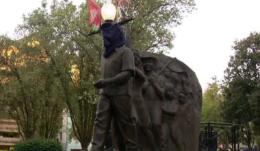 Sacramento city staff cover the head of César Chávez statue at plaza downtown
