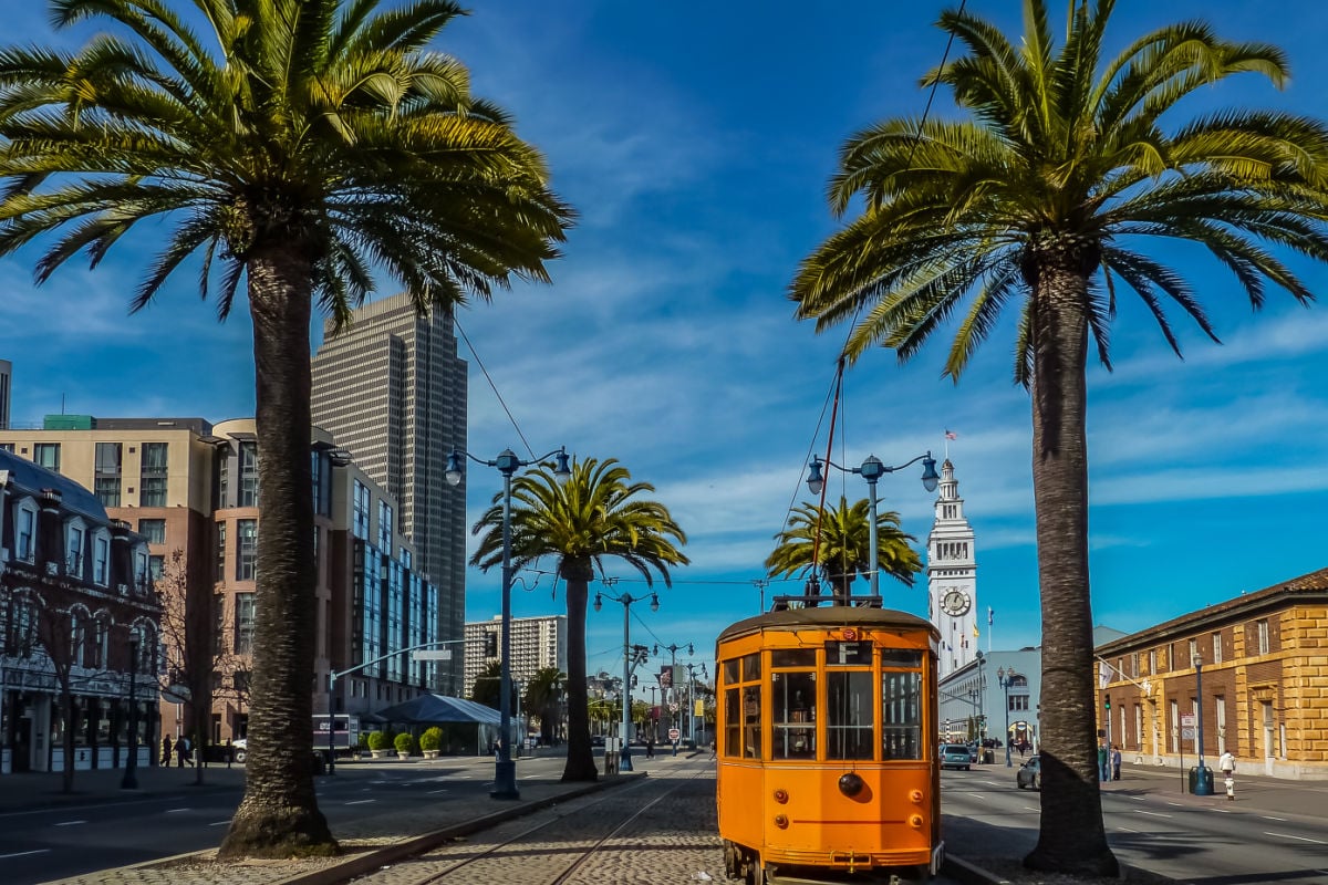 An old orange San Francisco cable car