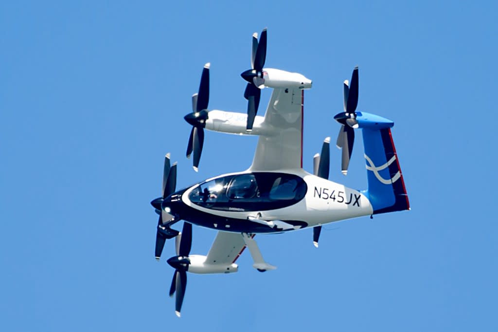 A Joby Aviation vertical takeoff and landing (eVTOL) aircraft flies over San Francisco on Thursday, Mar. 12, 2026. Noah Berger for California Post