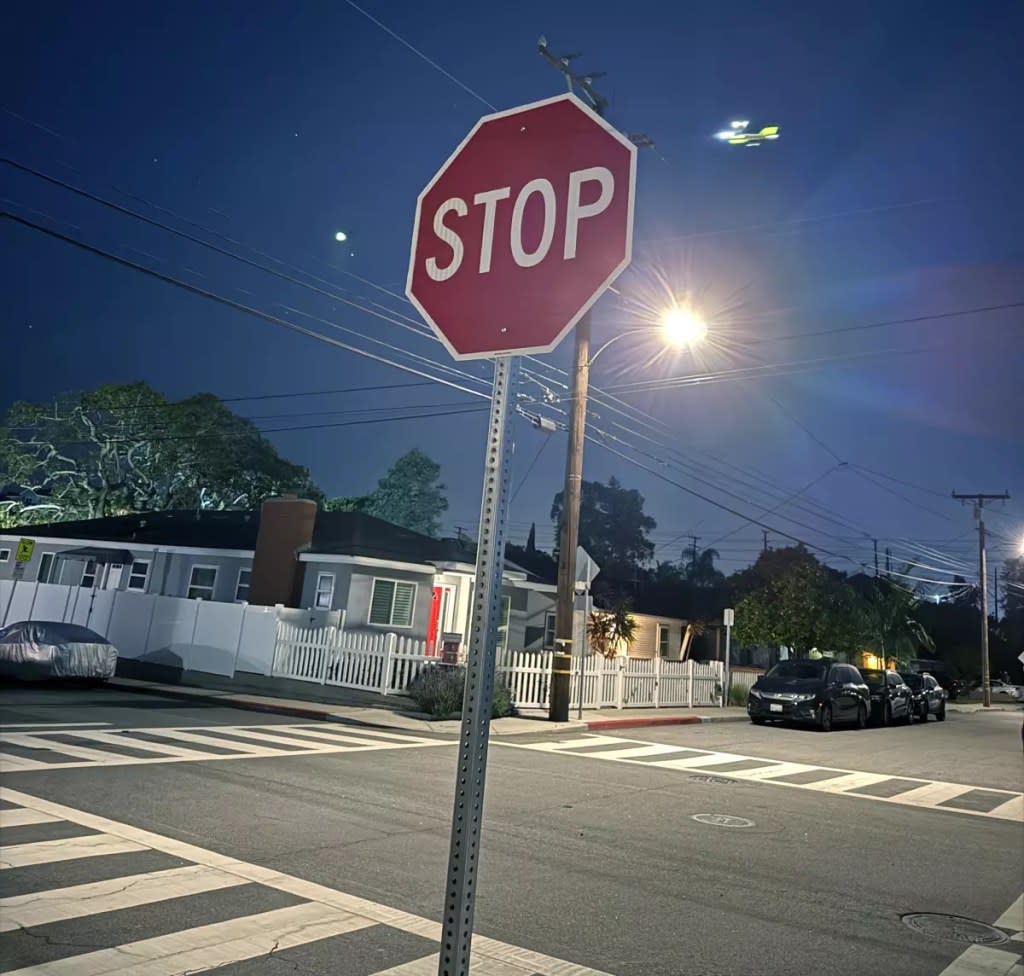He installed temporary stop signs. Joseph Brandlin