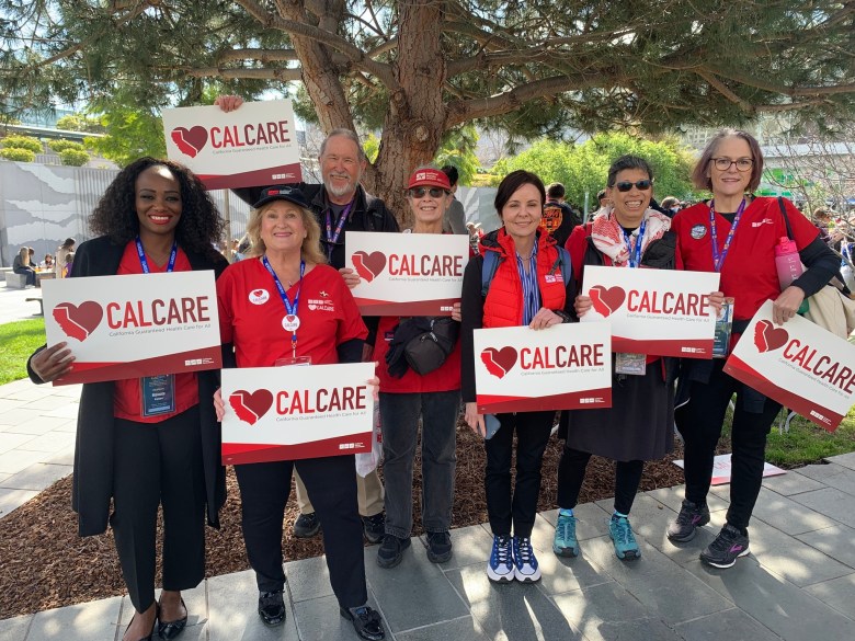 Nurses and single-payer advocates rally in support of CalCare outside the the California Democratic Party 2026 State Convention on Feb. 21. (Photo courtesy California Nurses Association/Capital & Main)