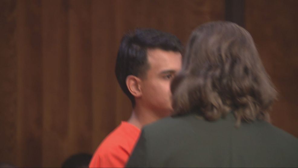 Alberto Felix appears in court on Friday, shielded by his attorney. (KBAK/KBFX)